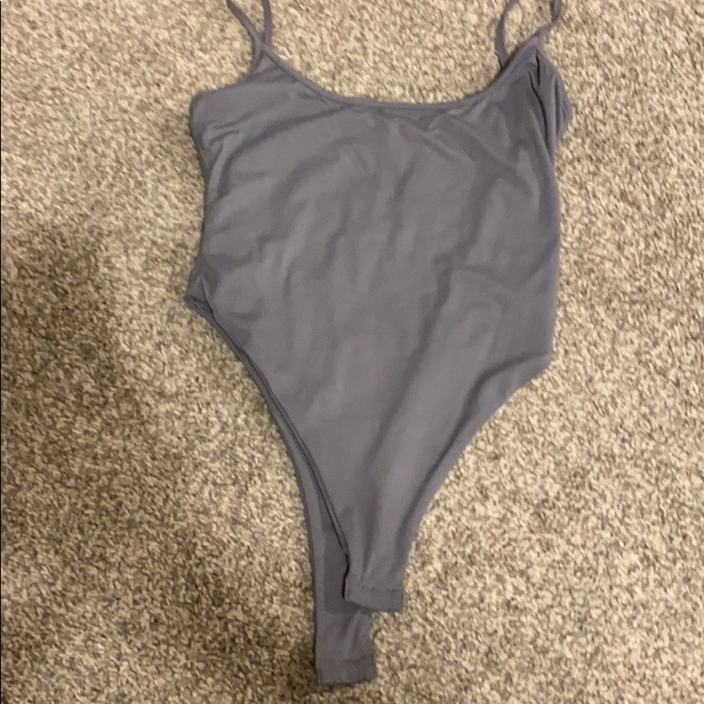 Grayish body suit